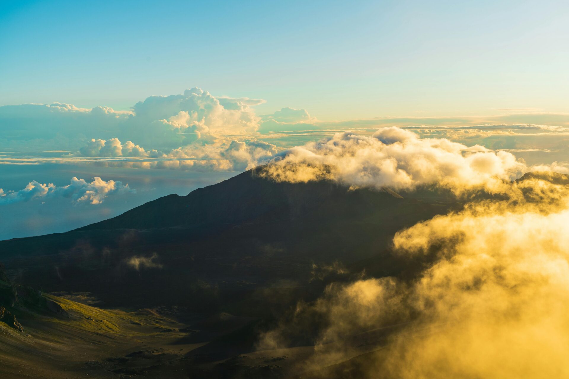White clouds over a mountain in Hawaii.